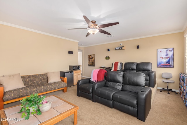 carpeted living room with crown molding and ceiling fan