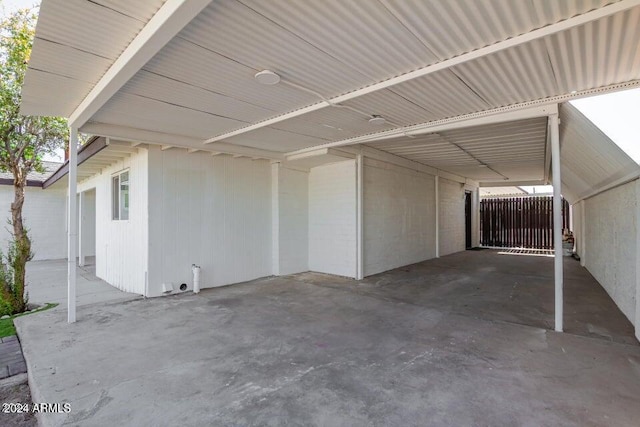 view of patio / terrace featuring a carport