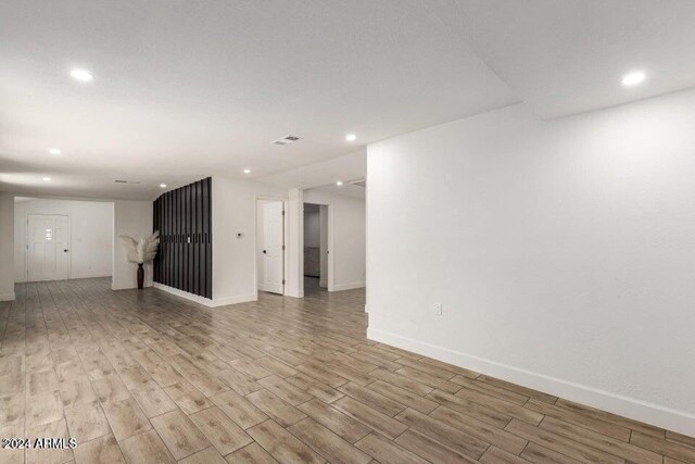 unfurnished living room featuring light hardwood / wood-style floors