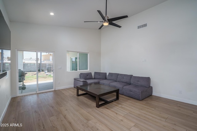 2345 N 28th Pl, Phoenix, AZ 85008 - living area with high vaulted ceiling, baseboards, light wood-style floors, a ceiling fan, and recessed lighting