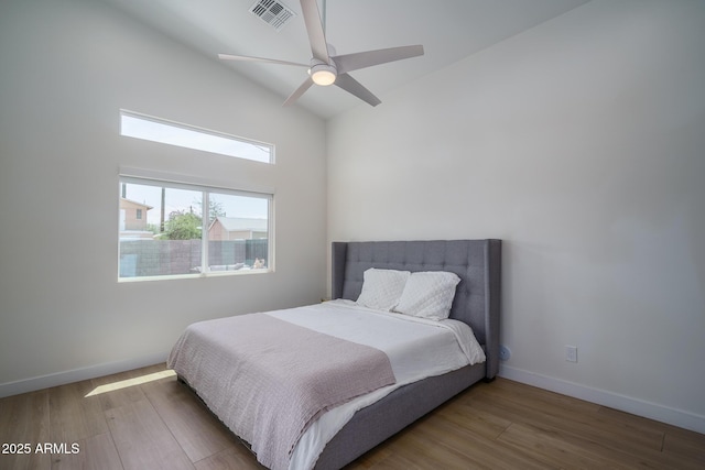 2345 N 28th Pl, Phoenix, AZ 85008 - bedroom with high vaulted ceiling, wood finished floors, baseboards, and a ceiling fan