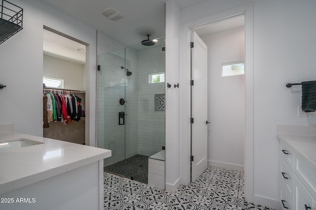 2345 N 28th Pl, Phoenix, AZ 85008 - bathroom with vanity, a stall shower, and healthy amount of natural light