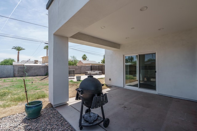 2345 N 28th Pl, Phoenix, AZ 85008 - fenced backyard with outdoor lounge area, a patio, and a grill