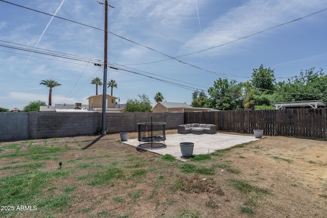 2345 N 28th Pl, Phoenix, AZ 85008 - fenced backyard featuring an outdoor hangout area and a patio