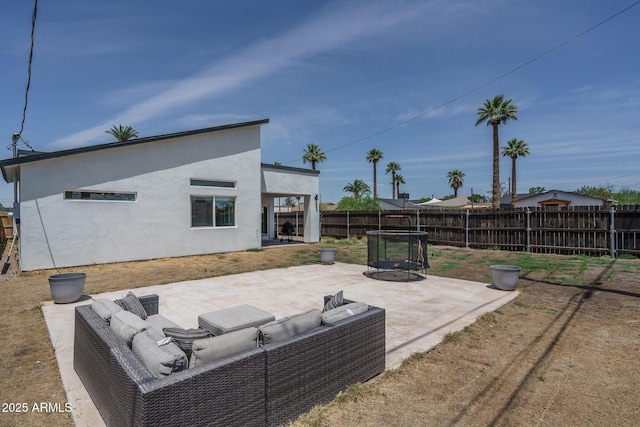 2345 N 28th Pl, Phoenix, AZ 85008 - fenced backyard with a patio and an outdoor living space with a fire pit