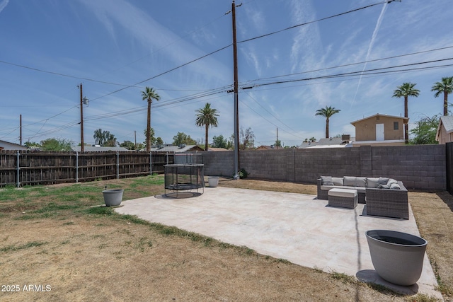 2345 N 28th Pl, Phoenix, AZ 85008 - fenced backyard featuring a patio and outdoor lounge area