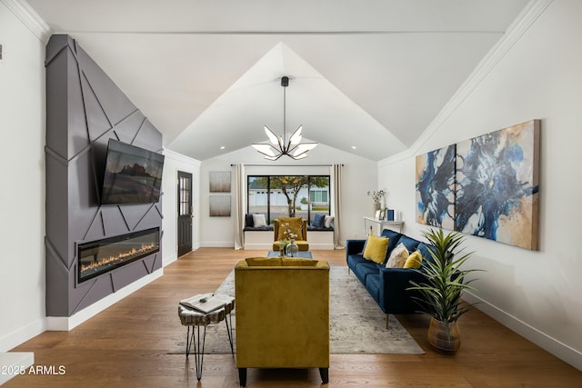 8419 E Rancho Vista Dr, Scottsdale, AZ 85251 - living room featuring wood finished floors, baseboards, a large fireplace, and a chandelier