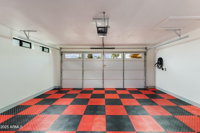 8419 E Rancho Vista Dr, Scottsdale, AZ 85251 - garage featuring baseboards and a garage door opener
