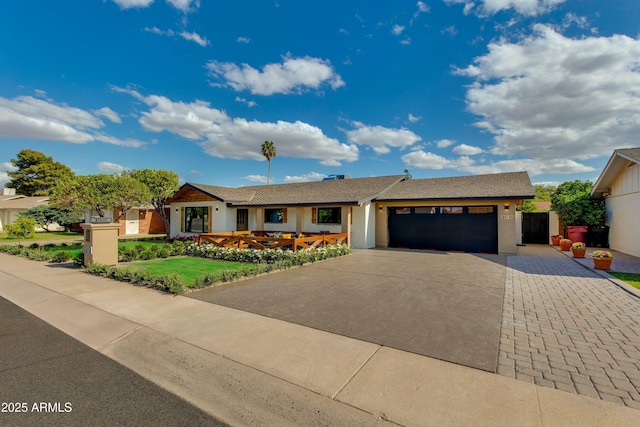 8419 E Rancho Vista Dr, Scottsdale, AZ 85251 - single story home with stucco siding, driveway, and a garage