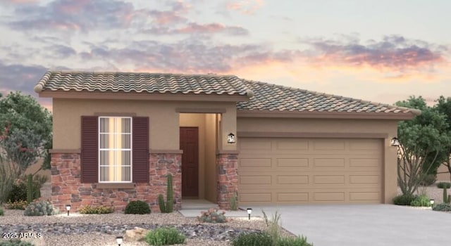 1365 S 215th Ln, Buckeye, AZ 85326 - view of front of house featuring stone siding, a garage, driveway, and stucco siding