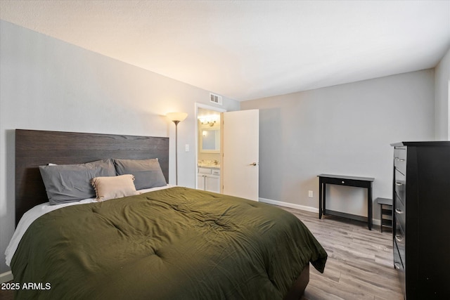 bedroom featuring light hardwood / wood-style flooring