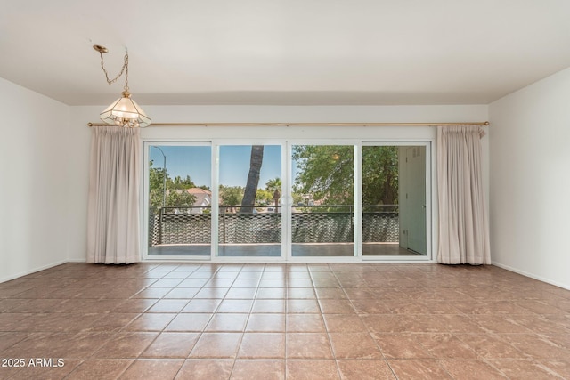 330 W Maryland Ave Unit 207, Phoenix, AZ 85013 - unfurnished room featuring baseboards and light stone finish floors
