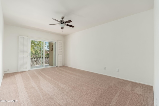 330 W Maryland Ave Unit 207, Phoenix, AZ 85013 - empty room featuring light colored carpet and ceiling fan