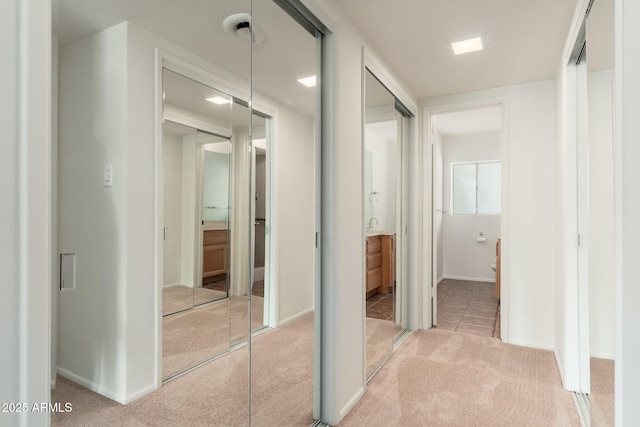 330 W Maryland Ave Unit 207, Phoenix, AZ 85013 - hallway featuring carpet and baseboards