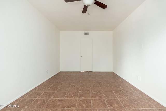 330 W Maryland Ave Unit 207, Phoenix, AZ 85013 - empty room with a ceiling fan and stone finish flooring