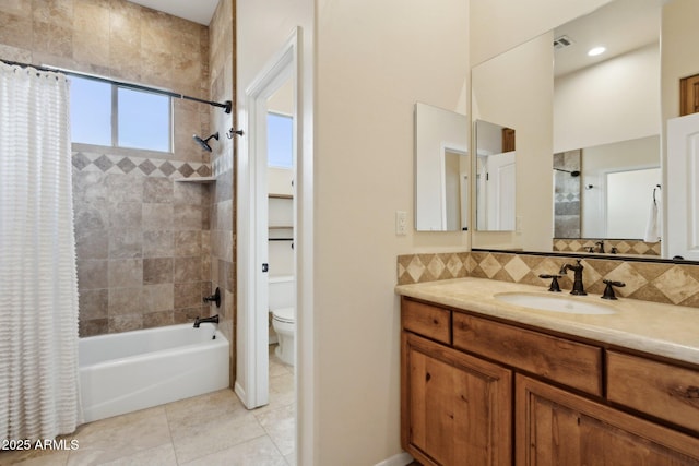 full bathroom featuring visible vents, decorative backsplash, tile patterned floors, toilet, and shower / tub combo with curtain