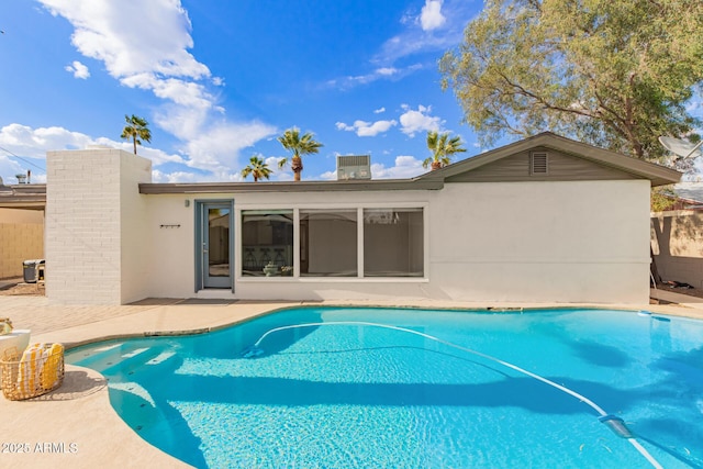 view of pool featuring a fenced in pool and a patio area