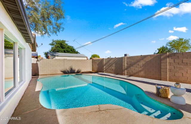 6907 E Portland St, Scottsdale, AZ 85257 - view of pool featuring a fenced backyard