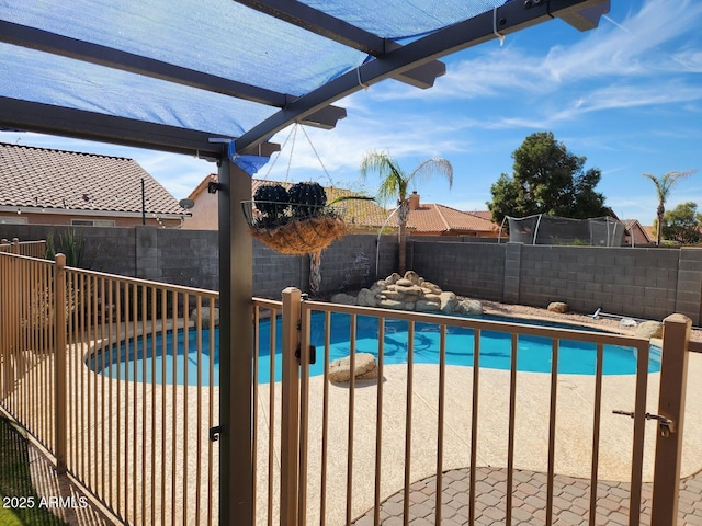 view of pool with a pergola