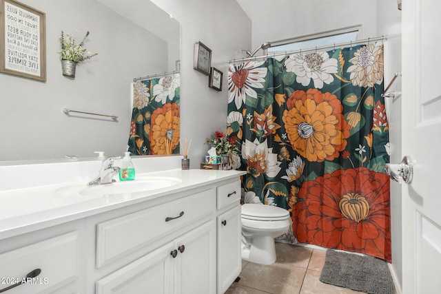 full bathroom featuring toilet, tile patterned floors, a shower with shower curtain, and vanity