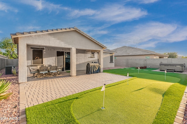 rear view of property with a patio area