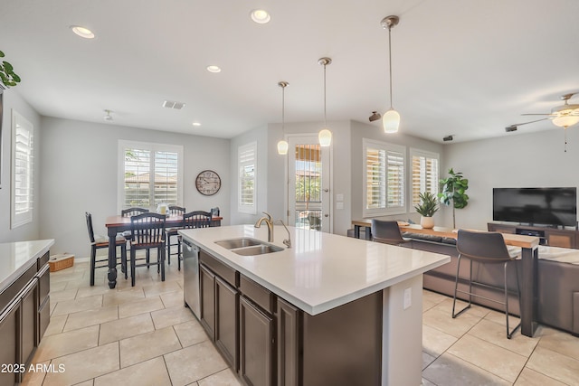 4229 W Magdalena Ln, Laveen, AZ 85339 - kitchen with visible vents, a sink, light tile patterned flooring, and open floor plan