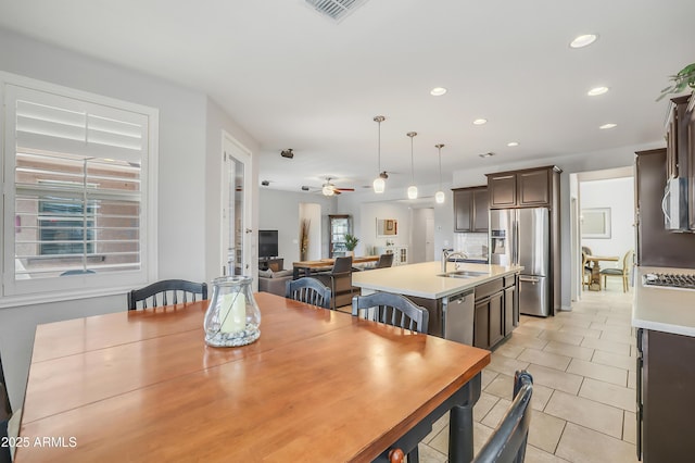 4229 W Magdalena Ln, Laveen, AZ 85339 - dining room featuring visible vents, a ceiling fan, light tile patterned flooring, and recessed lighting