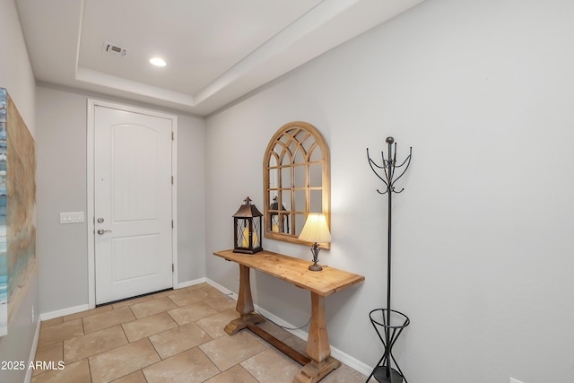 4229 W Magdalena Ln, Laveen, AZ 85339 - foyer entrance with baseboards, a tray ceiling, and visible vents