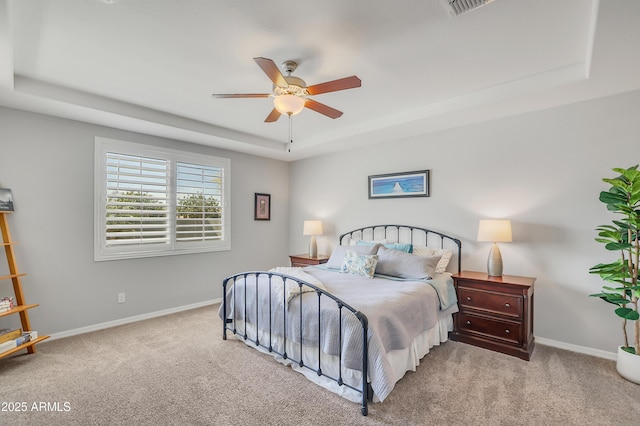 4229 W Magdalena Ln, Laveen, AZ 85339 - carpeted bedroom with baseboards, ceiling fan, and a raised ceiling