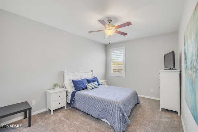 4229 W Magdalena Ln, Laveen, AZ 85339 - bedroom with baseboards, ceiling fan, and light carpet