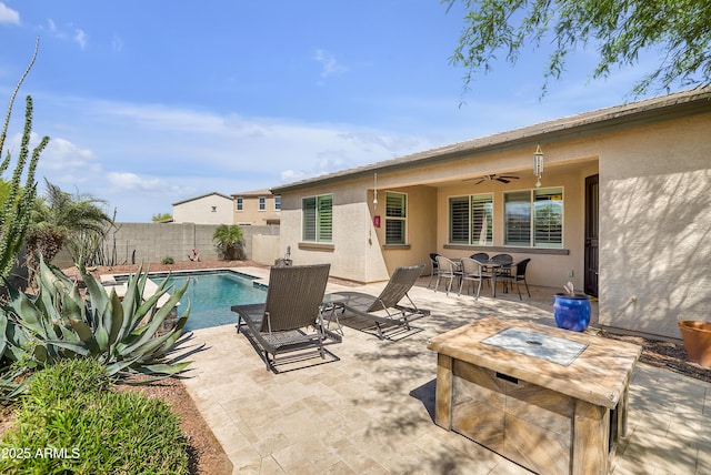 4229 W Magdalena Ln, Laveen, AZ 85339 - view of swimming pool featuring outdoor dining space, a fenced backyard, a fenced in pool, a ceiling fan, and a patio