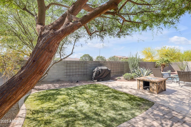 4229 W Magdalena Ln, Laveen, AZ 85339 - view of yard with a fenced backyard, a patio, and a fire pit