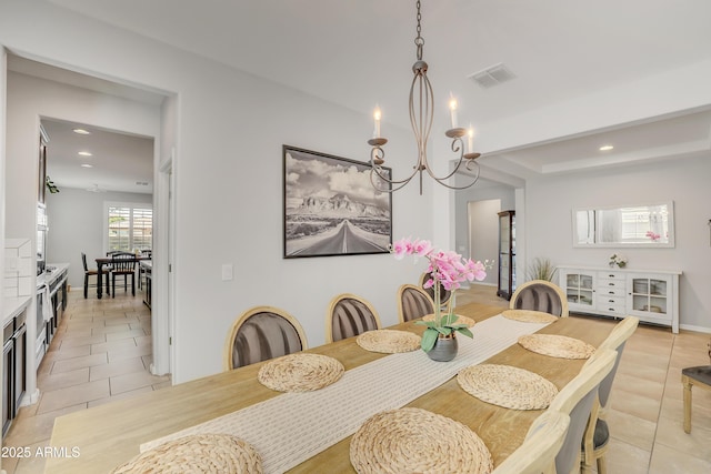 4229 W Magdalena Ln, Laveen, AZ 85339 - dining space featuring light tile patterned floors, a notable chandelier, recessed lighting, and visible vents