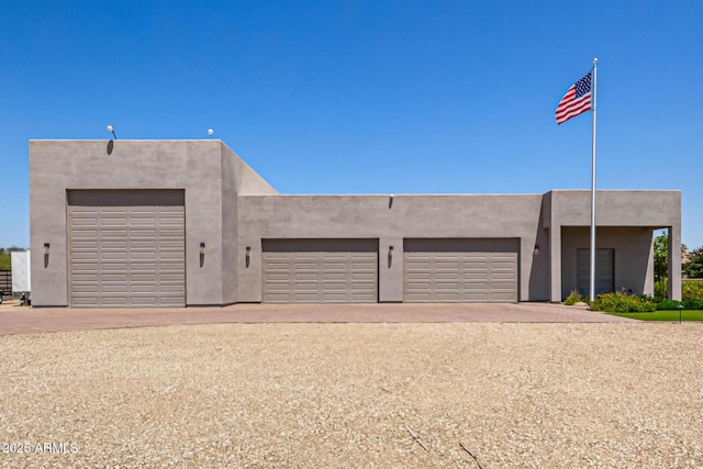 38415 N 25th Ave, Phoenix, AZ 85086 - southwest-style home featuring driveway and an attached garage