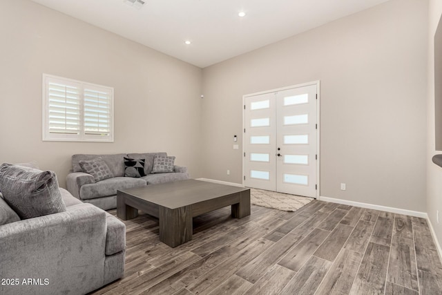 38415 N 25th Ave, Phoenix, AZ 85086 - living room featuring wood finished floors and recessed lighting