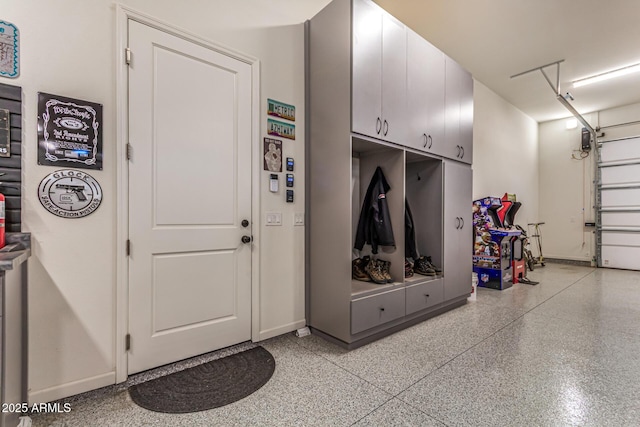 38415 N 25th Ave, Phoenix, AZ 85086 - mudroom featuring dark speckled floor and baseboards