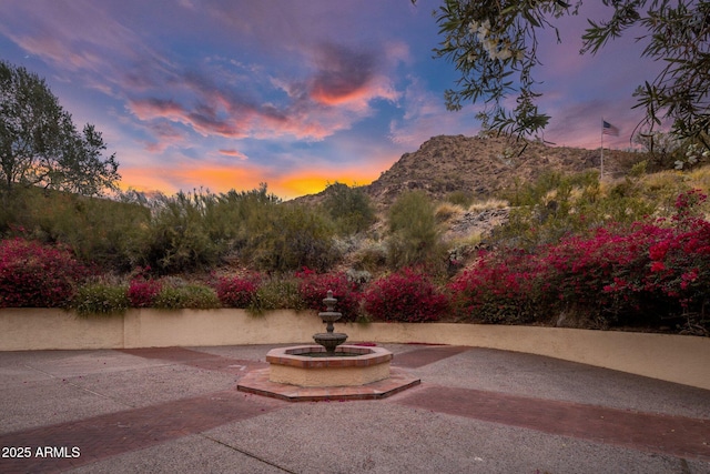 view of patio / terrace featuring a mountain view