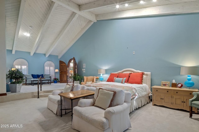 bedroom featuring beamed ceiling, light carpet, wooden ceiling, arched walkways, and high vaulted ceiling