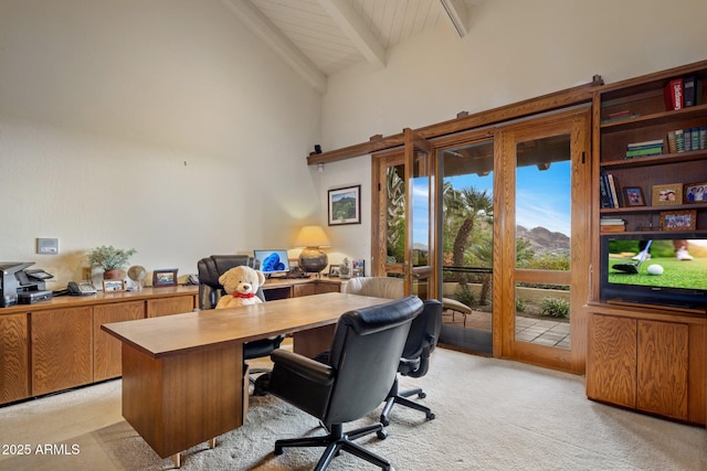 office space with wood ceiling, beamed ceiling, light colored carpet, and high vaulted ceiling