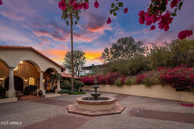 patio terrace at dusk with driveway