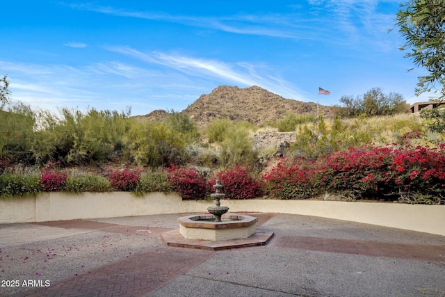 view of patio / terrace with a mountain view