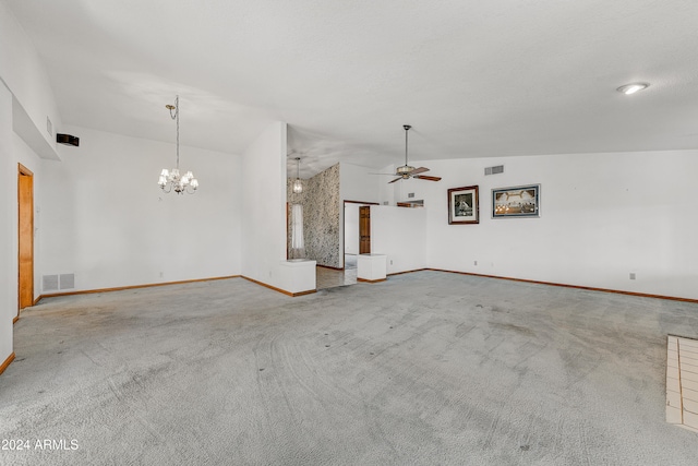 unfurnished living room with light carpet, ceiling fan with notable chandelier, and vaulted ceiling