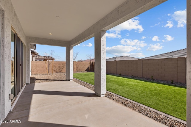 view of patio featuring a fenced backyard