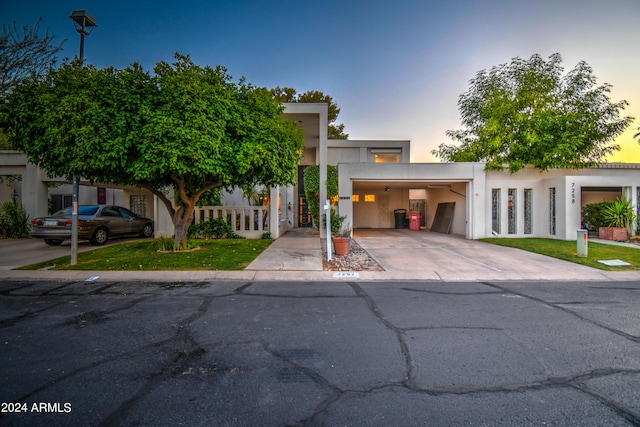 view of front of house featuring a carport