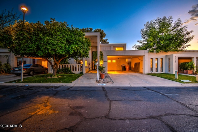 view of front of house with a carport