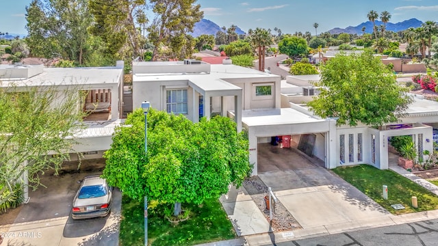 view of front of property with a mountain view