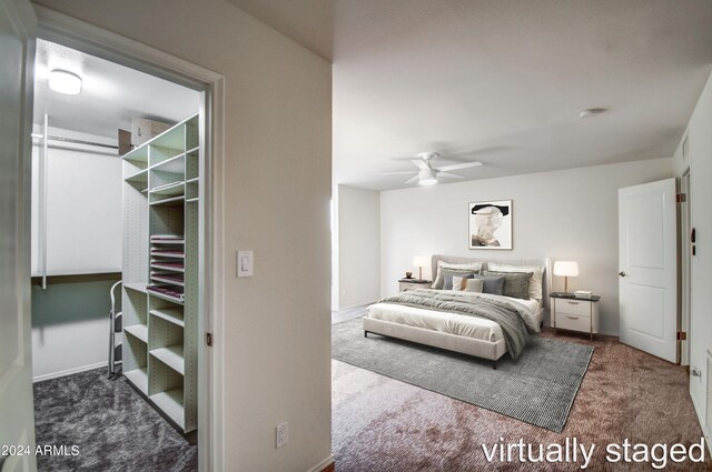 bedroom with ceiling fan and carpet