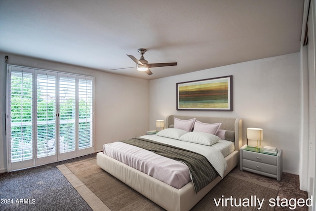 bedroom with ceiling fan, access to exterior, and dark colored carpet