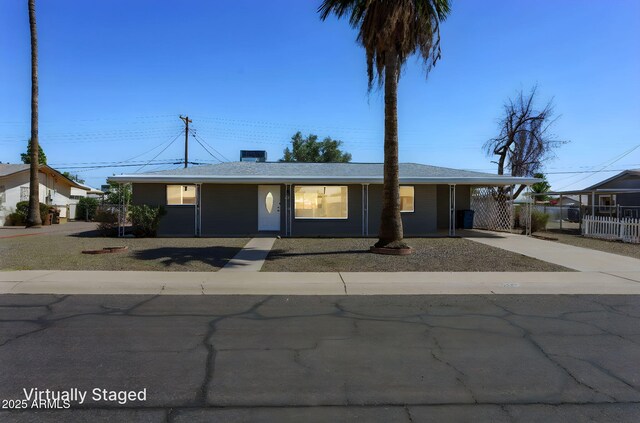 5455 E Baltimore St, Mesa, AZ 85205 - single story home with concrete driveway and a carport