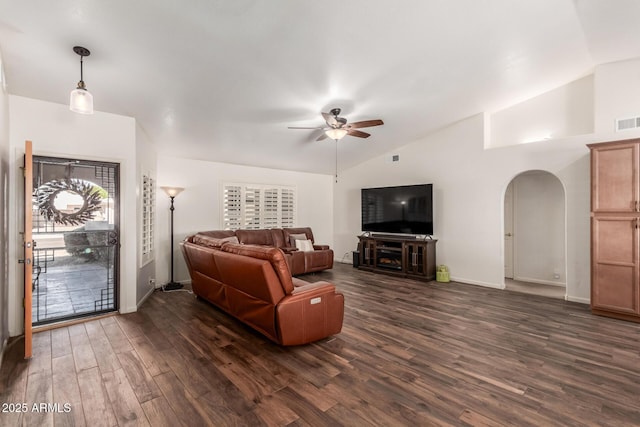 living room with lofted ceiling, dark hardwood / wood-style floors, and ceiling fan